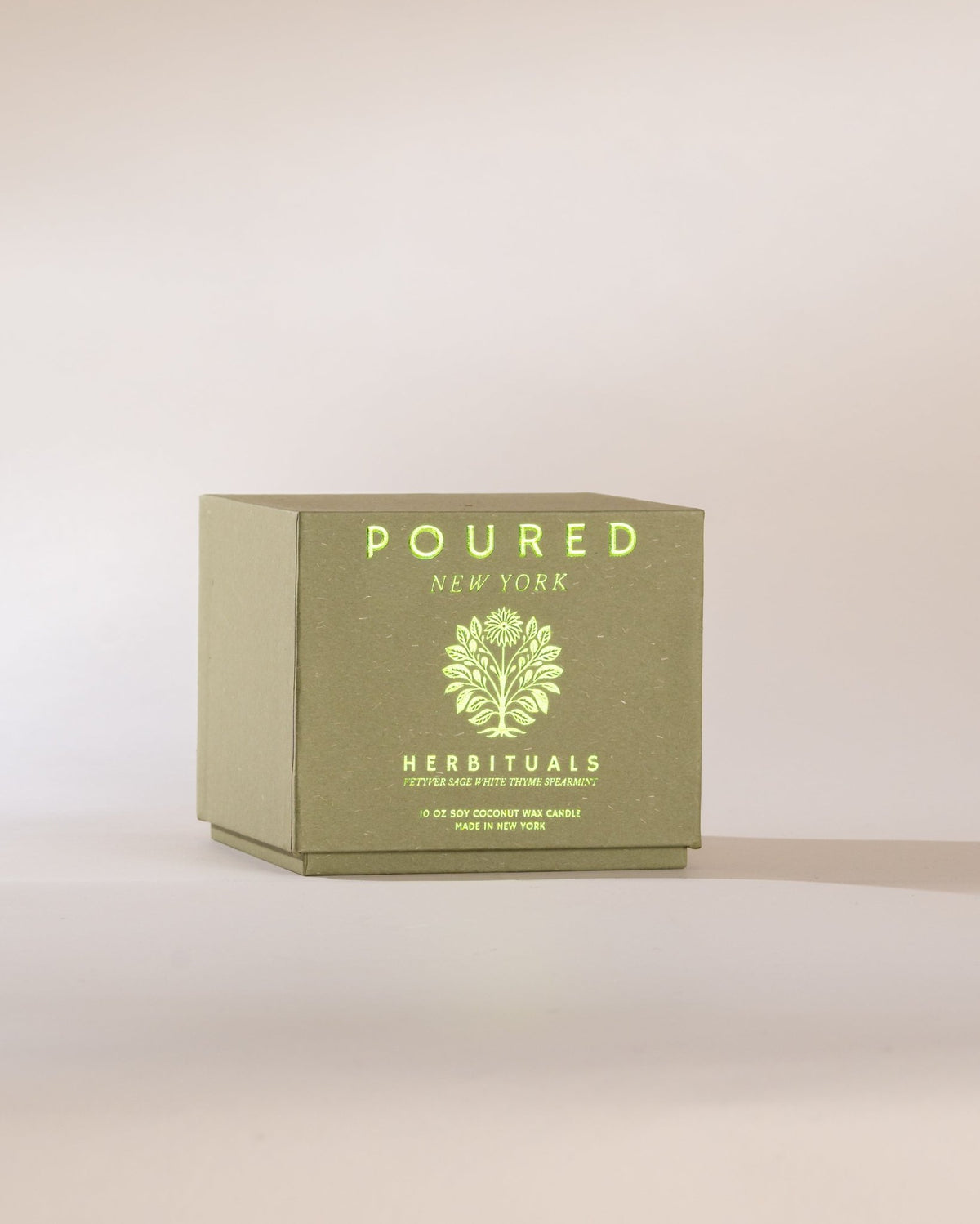 Green box with 'POURED NEW YORK' branding on a beige background