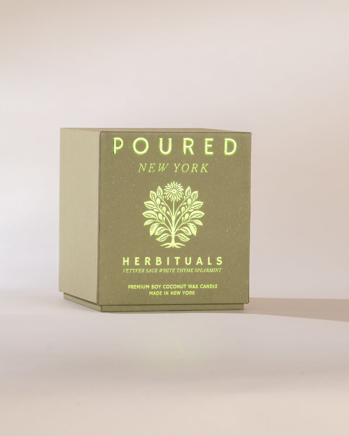 Box of 'Poured New York' Herbituals candle on a light background