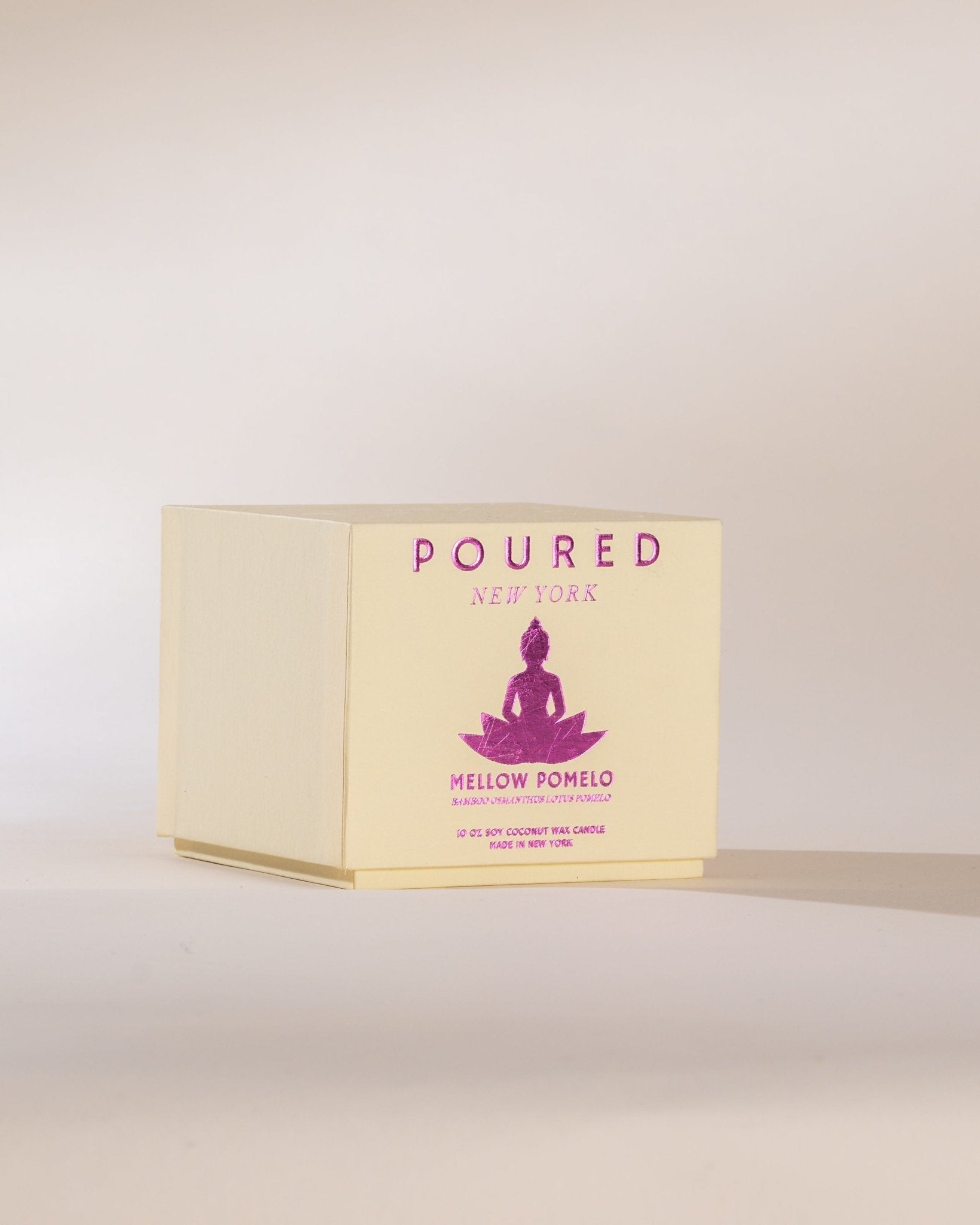 Poured New York 'Mellow Pomelo' Niche Parfum box on neutral background.