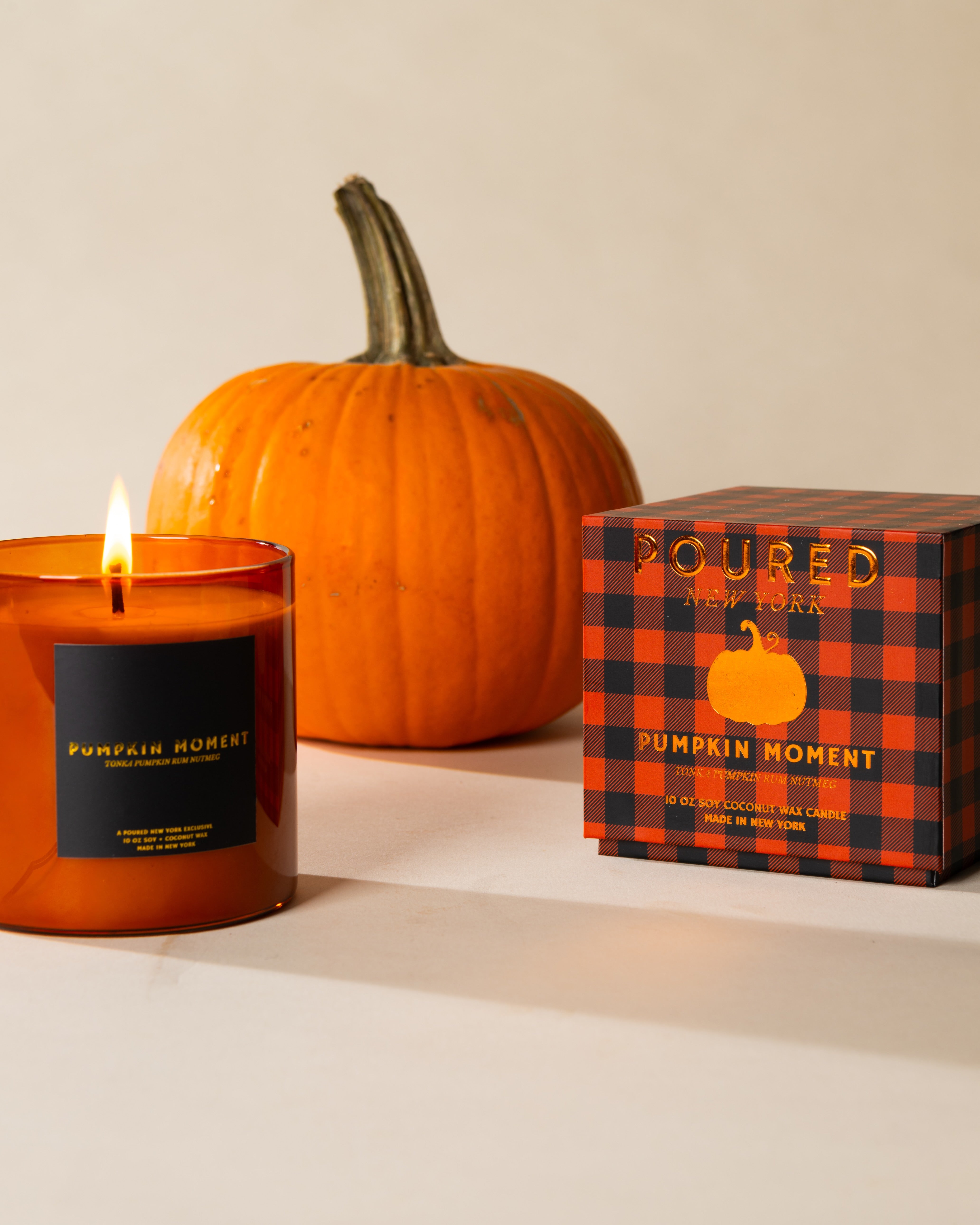 Poured New York 'Pumpkin Moment' candle styled in a lifestyle scene