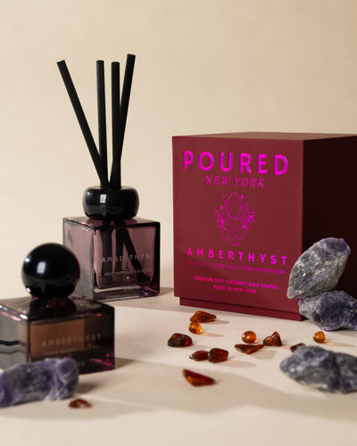Poured New York 'Amberthyst' candle styled in a lifestyle scene