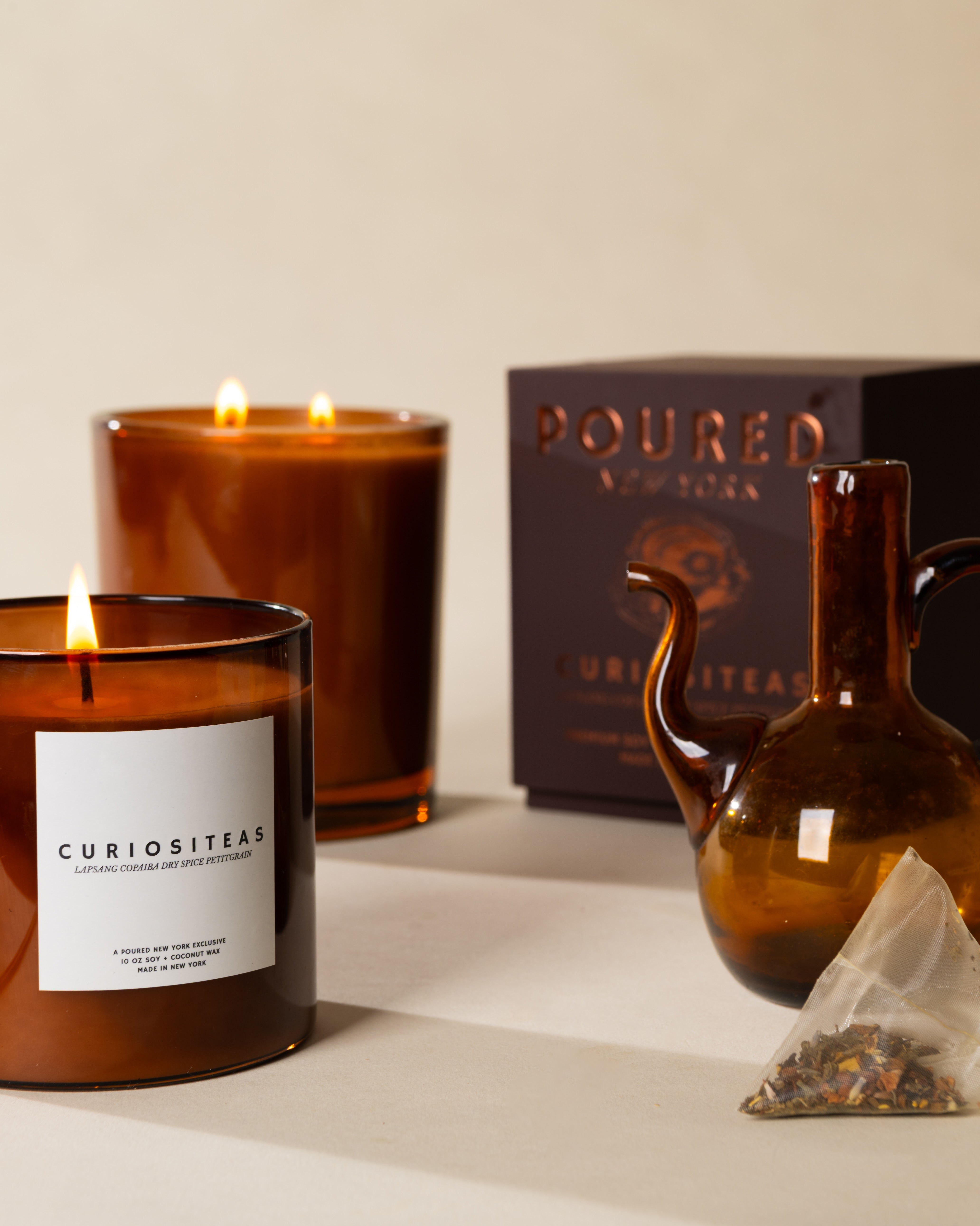 Poured New York 'Curiositeas' candle styled in a lifestyle scene