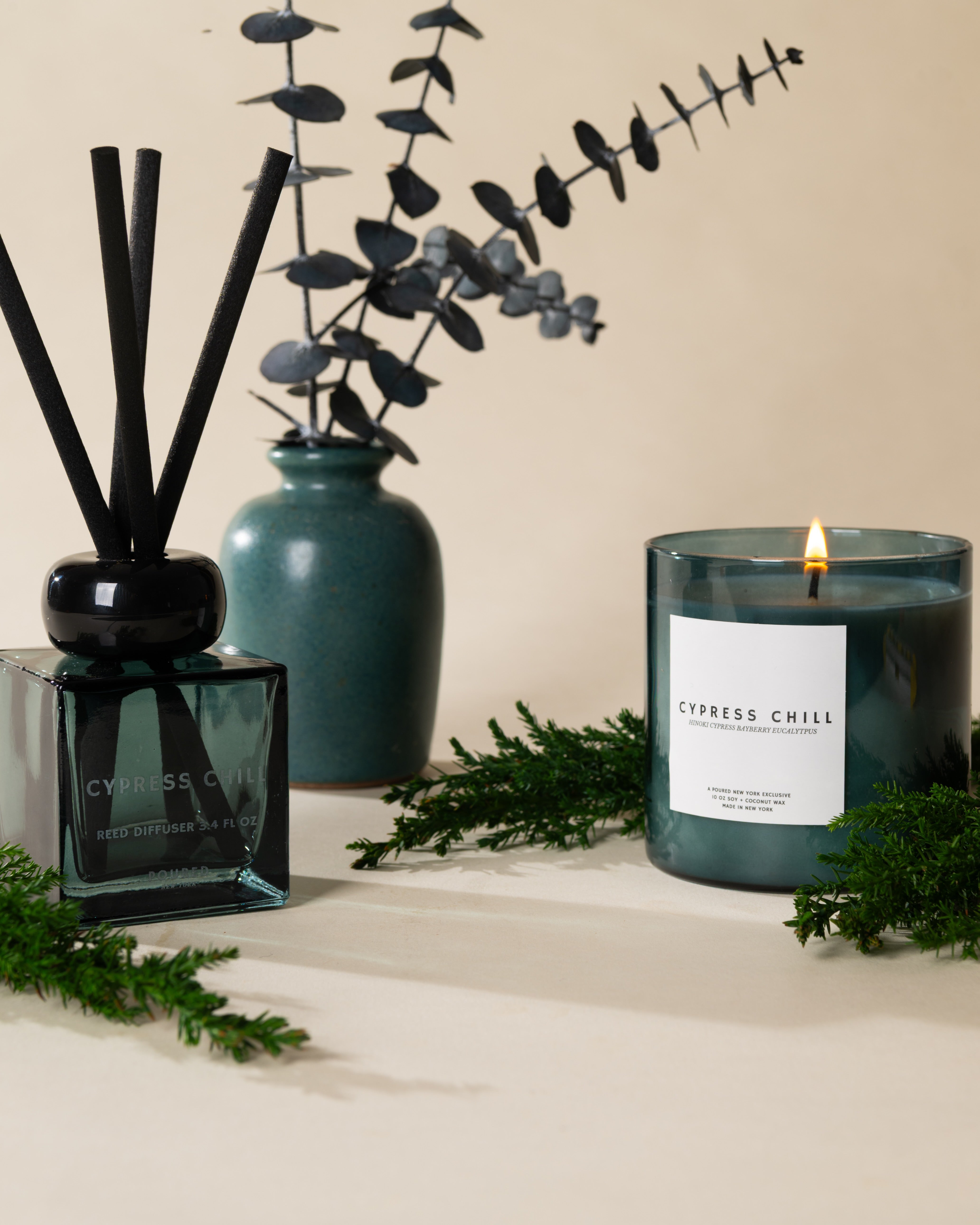 Poured New York 'Cypress Chill' candle styled in a lifestyle scene