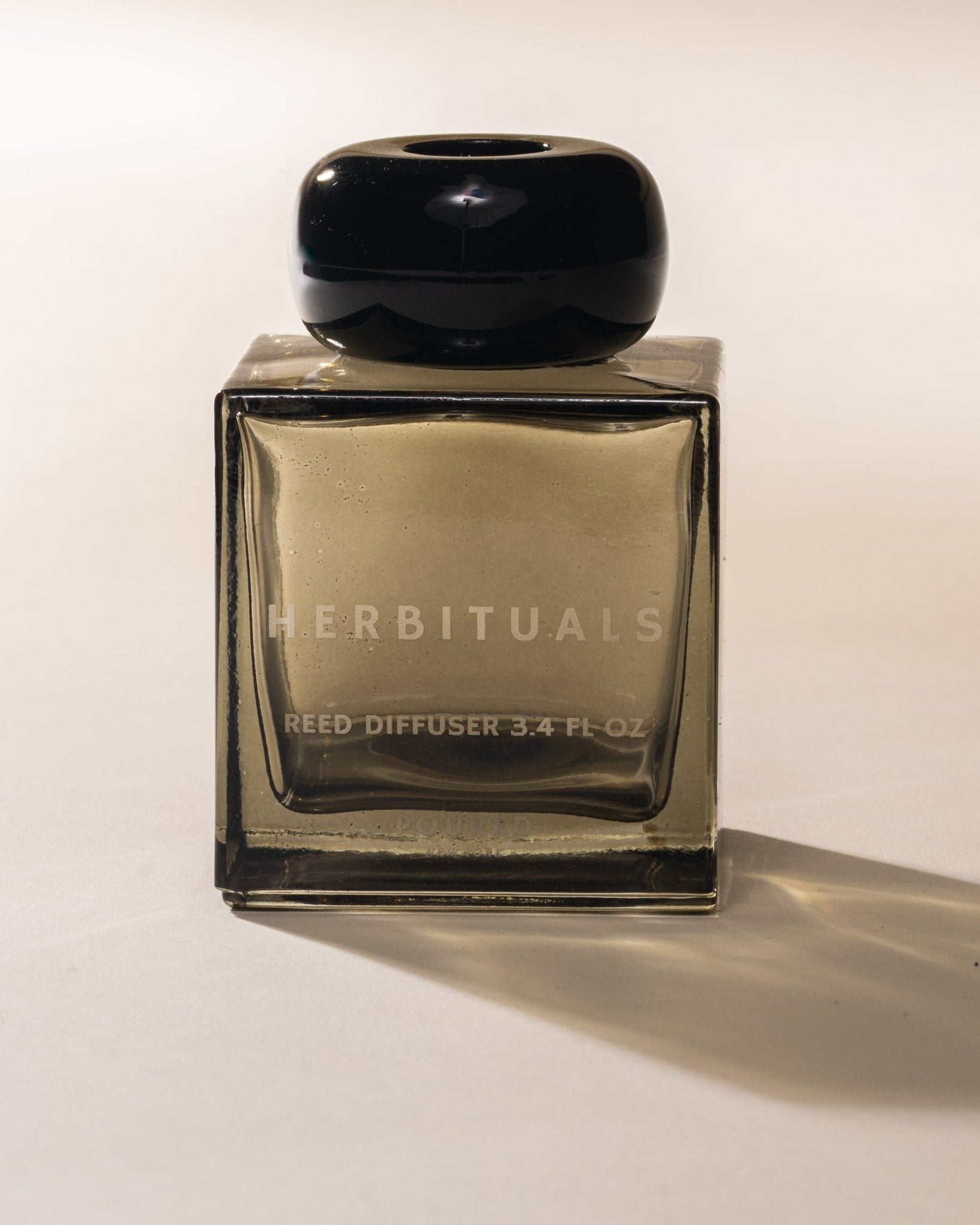 Herbituals reed diffuser on a white background