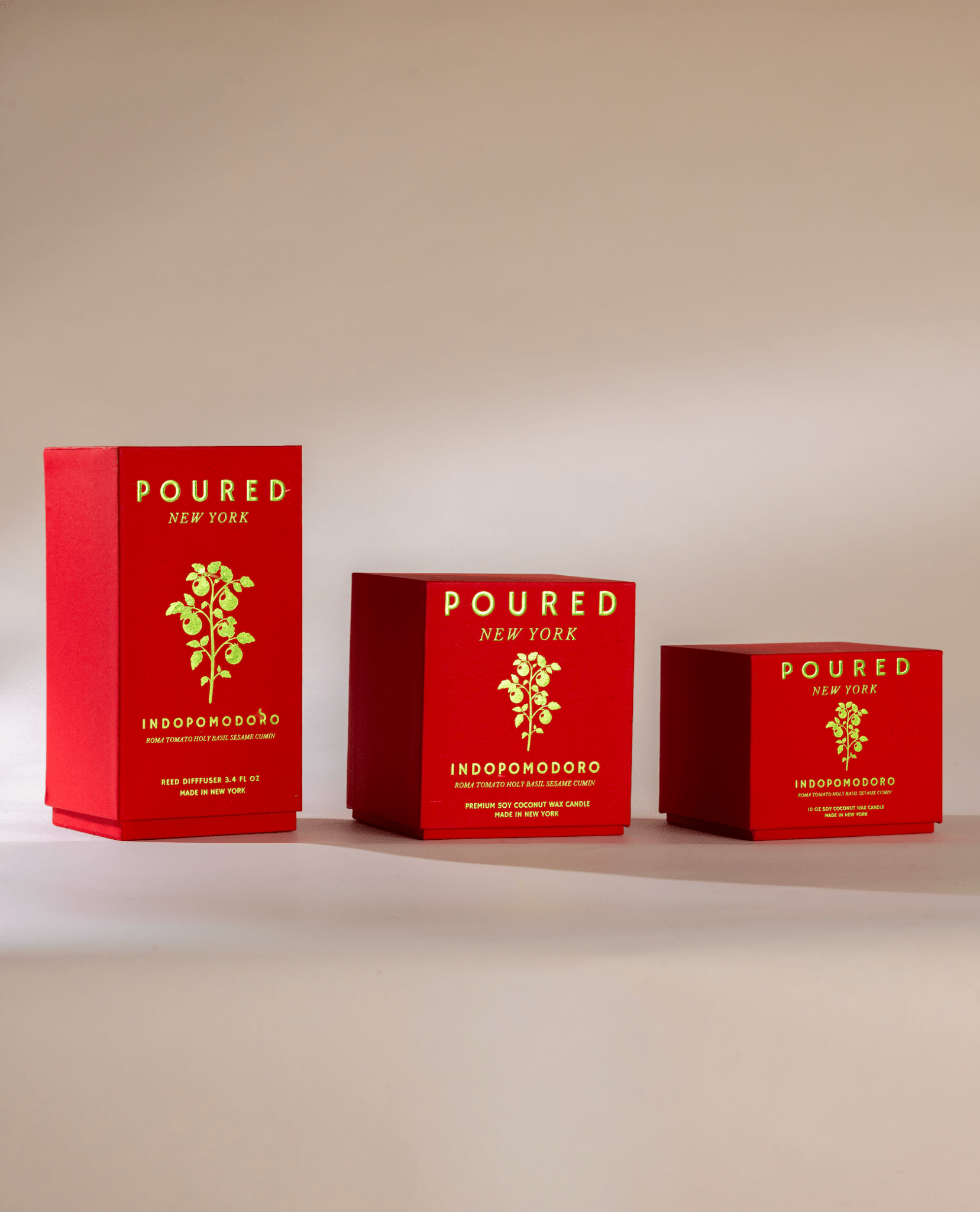 Poured New York 'Indopomodoro' tomato red boxes in different sizes with tomato vine decal on neutral background