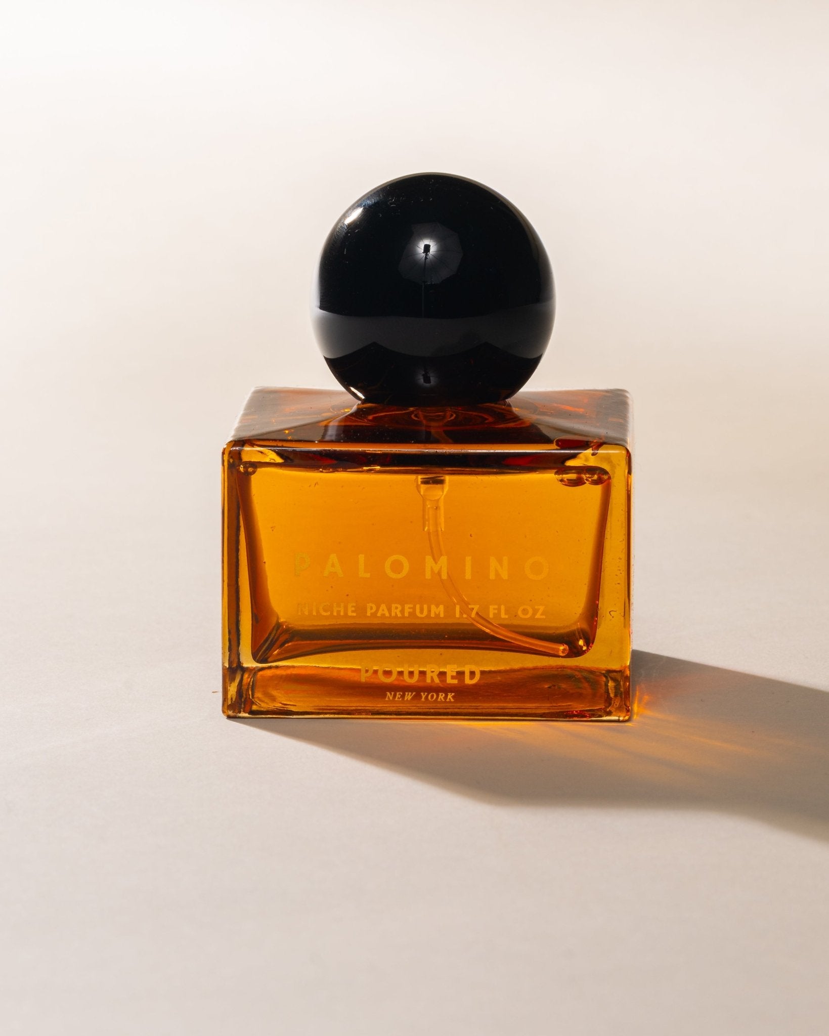 Poured New York 'Palomino' niche parfum square glass bottle with black circular cap