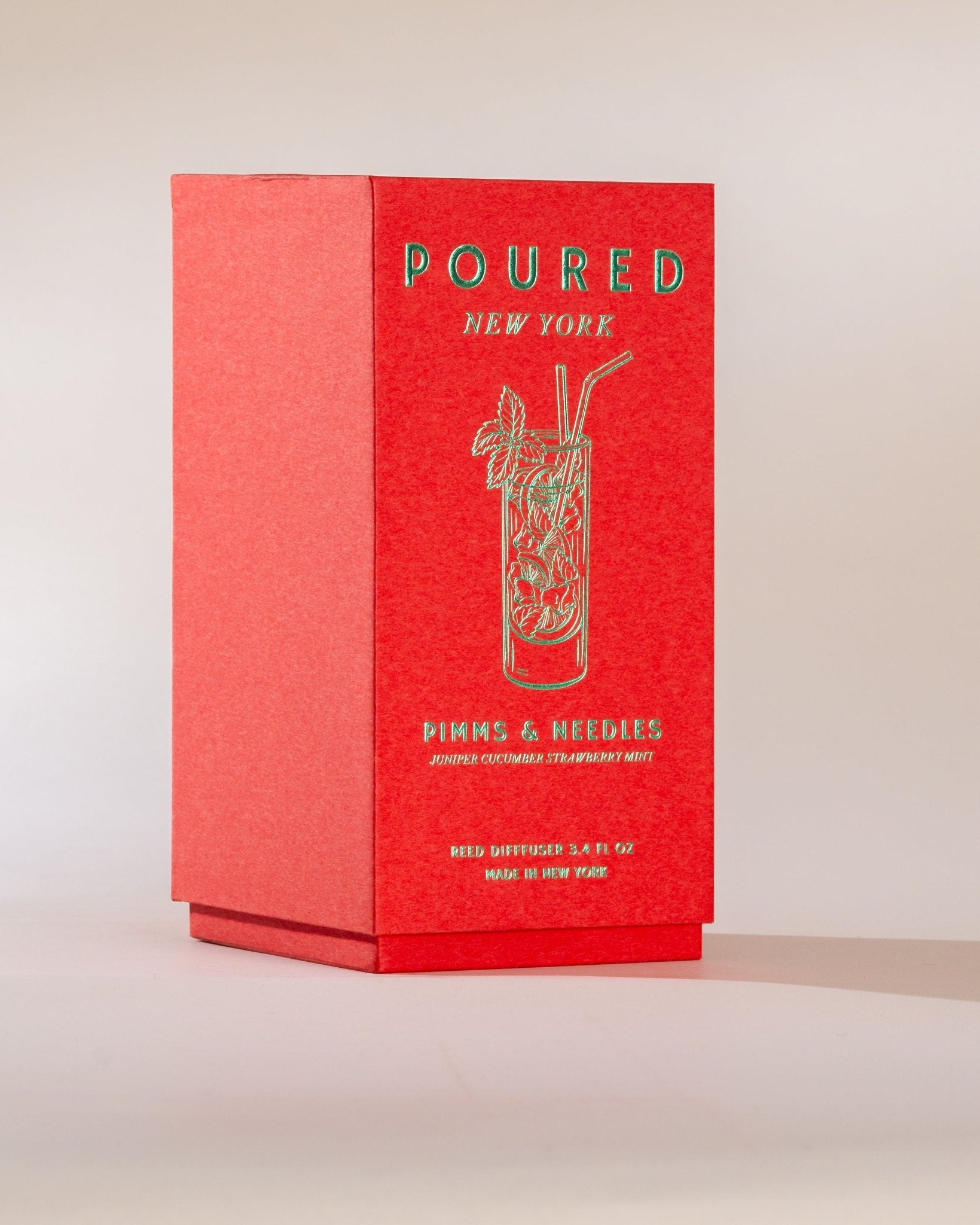 Red box with 'POURED NEW YORK' branding and a cocktail illustration on a beige background