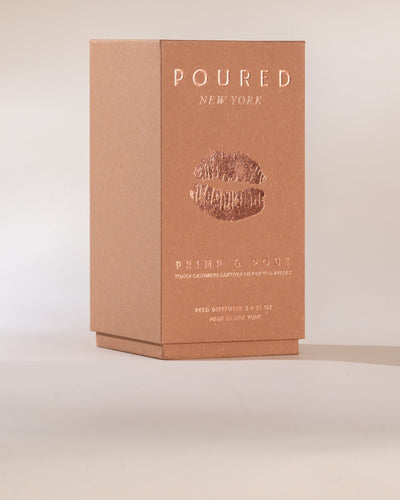 'Primp & Pout' reed diffuser box with a pouty lip decal on a neutral background