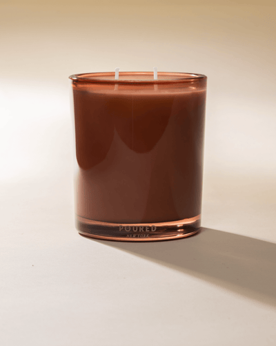 Poured New York ' Primp & Pout' Two Wick Candle on a neutral background