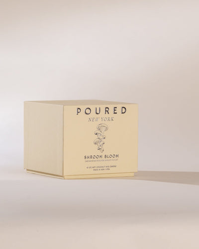 Box of 'Poured New York' mushroom product on a beige background
