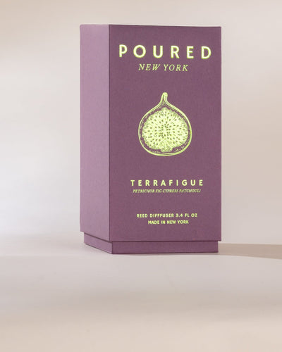 Purple box with 'POURED NEW YORK' branding and a fig illustration on a light beige background